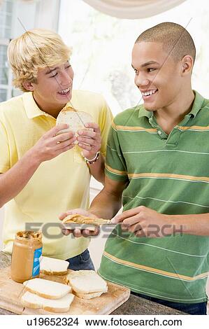 Teenage Boys Making Sandwiches View Large Photo Image Picture - Teenage Boys Making Sandwiches . Fotosearch