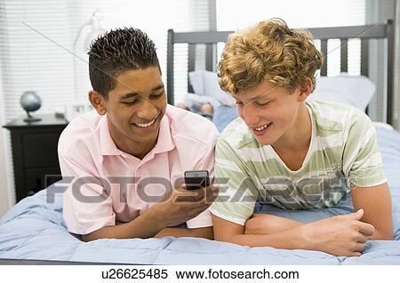 Teenage Boys Playing Video Games View Large Photo Image Stock Photography - Teenage Boys Playing Video Games. Fotosearch
