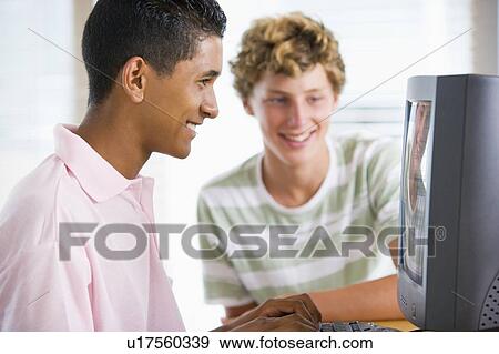 Teenage Boys Using Desktop Computer View Large Photo Image Stock Photo - Teenage Boys Using Desktop Computer . Fotosearch