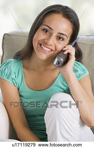 Stock Photo - Teenage Girl Chatting On Telephone. Fotosearch