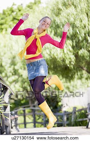 Teenage Girl Frolicking Outdoors View Large Photo Image Picture - Teenage Girl Frolicking Outdoors. Fotosearch