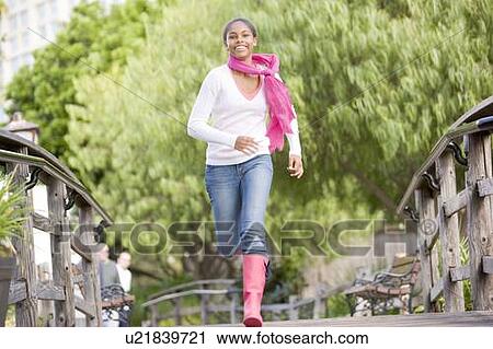 Teenage Girl Jogging In Park View Large Photo Image Stock Image - Teenage Girl Jogging In Park . Fotosearch