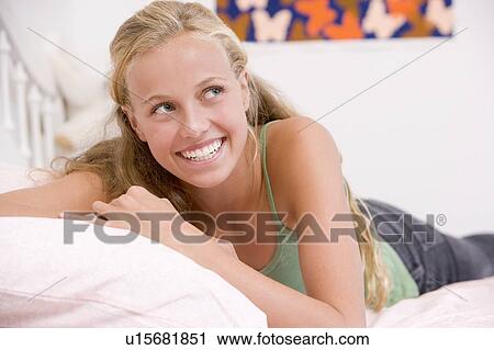 Teenage Girl Lying On Her Bed View Large Photo Image Stock Image - Teenage Girl Lying On Her Bed . Fotosearch