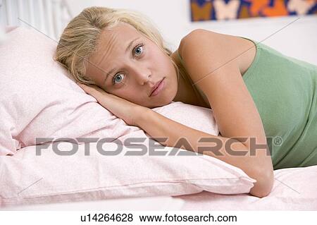 Teenage Girl Lying On Her Bed View Large Photo Image Stock Photo - Teenage Girl Lying On Her Bed . Fotosearch
