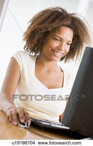 Teenage Girl Using Desktop Computer View Large Photo Image Picture - Teenage Girl Using Desktop Computer . Fotosearch