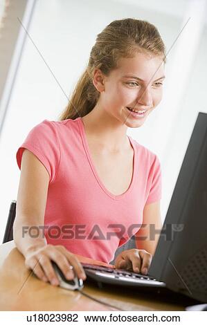 Teenage Girl Using Desktop Computer View Large Photo Image Stock Image - Teenage Girl Using Desktop Computer . Fotosearch