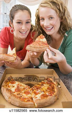 Teenage Girls Eating Pizza View Large Photo Image Stock Photography - Teenage Girls Eating Pizza . Fotosearch