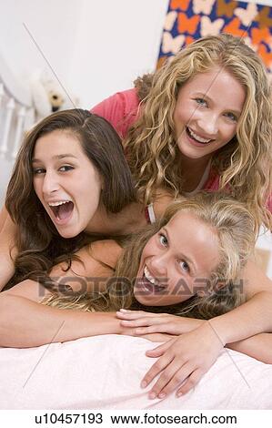 Stock Image - Teenage Girls Having Fun. Fotosearch