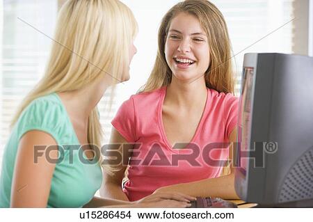 Picture - Teenage Girls Using Desktop Computer. Fotosearch