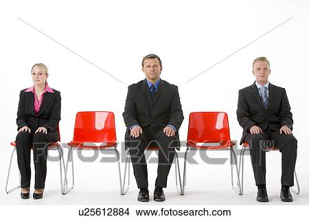 Three Business People Sitting On Red Plastic Seats View Large Photo Image Picture - Three Business People Sitting On Red Plastic Seats . Fotosearch