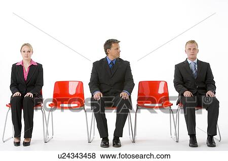 Stock Photo - Three Business People Sitting On Red Plastic Seats . Fotosearch