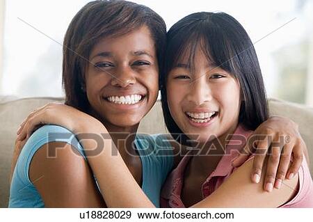 Stock Photo - Two Teenage Girls Smiling. Fotosearch