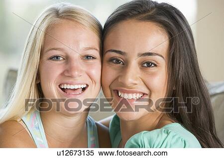 Stock Photography - Two Teenage Girls Smiling. Fotosearch