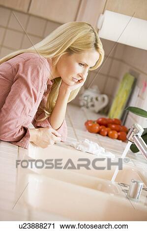 Woman At Kitchen Counter View Large Photo Image Stock Image - Woman At Kitchen Counter . Fotosearch