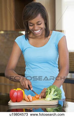 Woman Chopping Vegetables View Large Photo Image Stock Image - Woman Chopping Vegetables. Fotosearch