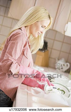 Woman Cleaning Dishes View Large Photo Image Stock Photograph - Woman Cleaning Dishes. Fotosearch