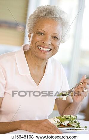 Woman Enjoying Salad View Large Photo Image Stock Photo - Woman Enjoying Salad. Fotosearch