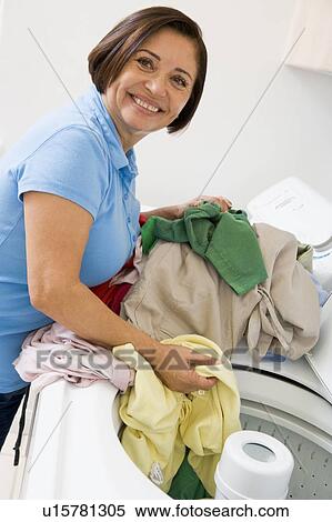 Woman Loading Washing Machine View Large Photo Image Stock Photography - Woman Loading Washing Machine. Fotosearch