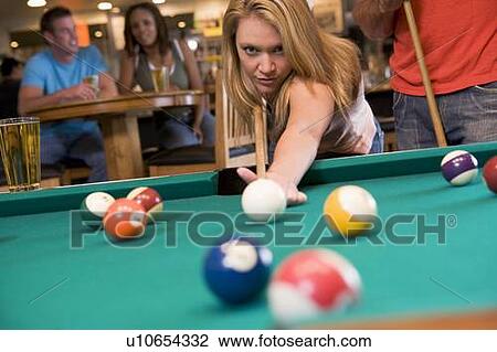 Woman playing pool View Large Photo Image Stock Image - Woman playing pool. Fotosearch
