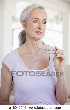 Stock Photograph - Woman With Glasses. Fotosearch
