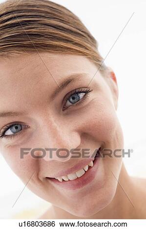 Stock Photograph - Woman's face smiling. Fotosearch