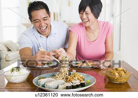 Young Couple Enjoying Chinese Food View Large Photo Image Stock Image - Young Couple Enjoying Chinese Food. Fotosearch
