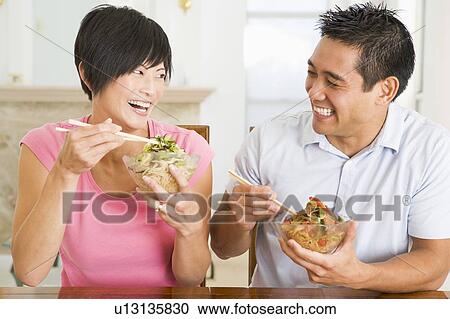 Young Couple Enjoying Chinese Food View Large Photo Image Stock Image - Young Couple Enjoying Chinese Food. Fotosearch