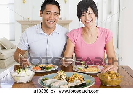 Young Couple Enjoying Chinese Food View Large Photo Image Stock Photo - Young Couple Enjoying Chinese Food. Fotosearch