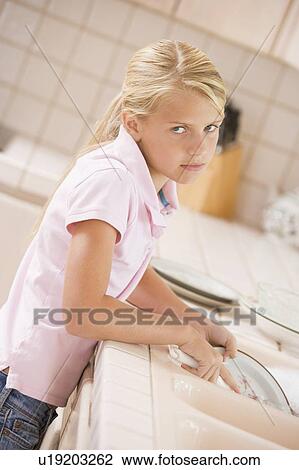 Young Girl Cleaning Dishes, View Large Photo Image Stock Image - Young Girl Cleaning Dishes, . Fotosearch