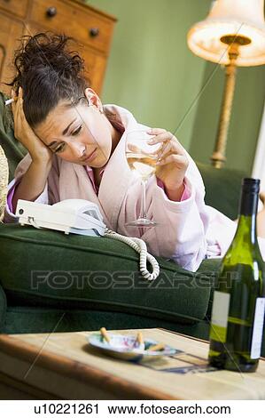 Young woman at home waiting by telephone View Large Photo Image Stock Image - Young woman at home waiting by telephone. Fotosearch