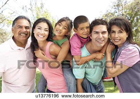 Stock Photograph - Extended Family Group In Park. Fotosearch
