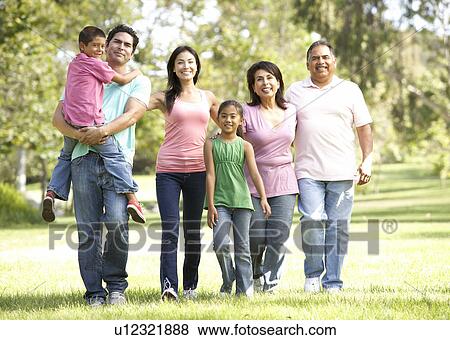 Extended Family Group Walking In Park View Large Photo Image Stock Photo - Extended Family Group Walking In Park. Fotosearch
