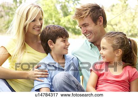 Family Enjoying Day In Park View Large Photo Image Stock Photo - Family Enjoying Day In Park. Fotosearch