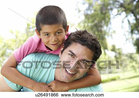Stock Photograph - Father And Son In Park. Fotosearch