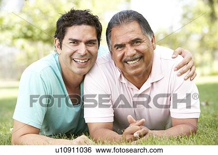 Father With Adult Son In Park View Large Photo Image Stock Photograph - Father With Adult Son In Park. Fotosearch