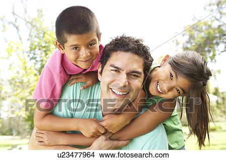Picture - Father With Children In Park. Fotosearch