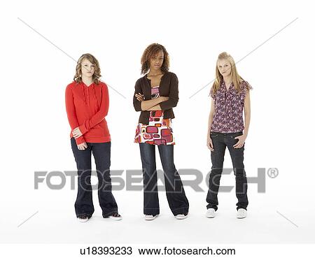 Stock Image - Full Length Portrait Of Three Teenage Girls. Fotosearch