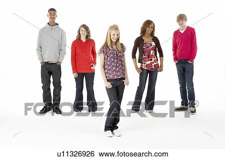 Stock Photograph - Full Length Studio Portrait Of Five Teenage Friends. Fotosearch