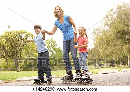 Grandmother And Grandchildren Skating In Park View Large Photo Image Stock Image - Grandmother And Grandchildren Skating In Park. Fotosearch