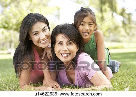 Stock Photograph - Grandmother With Daughter And Granddaughter In Park. Fotosearch
