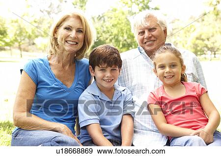 Grandparents And Grandchildren Enjoying Day In Park View Large Photo Image Stock Photo - Grandparents And Grandchildren Enjoying Day In Park. Fotosearch