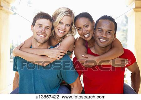 Stock Image - Group Of Young Friends Having Fun Together. Fotosearch