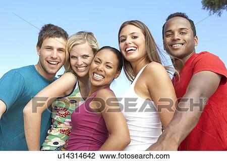 Group Of Young Friends Having Fun Together View Large Photo Image Stock Image - Group Of Young Friends Having Fun Together. Fotosearch
