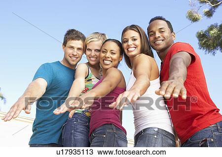 Group Of Young Friends Having Fun Together View Large Photo Image Stock Image - Group Of Young Friends Having Fun Together. Fotosearch