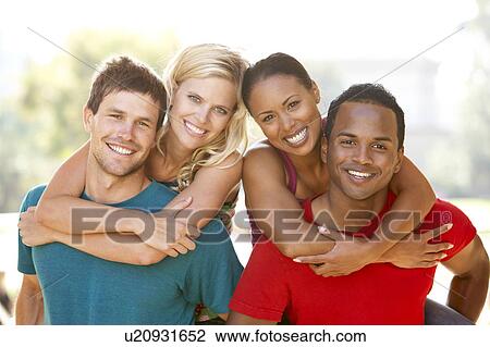 Stock Image - Group Of Young Friends Having Fun Together. Fotosearch