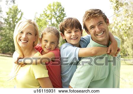 Mother And Father Giving Children Piggy Back View Large Photo Image Stock Image - Mother And Father Giving Children Piggy Back. Fotosearch