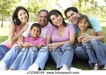 Picture - Portrait Of Extended Family Group In Park. Fotosearch
