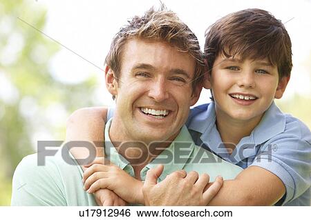 Portrait Of Father And Son In Park View Large Photo Image Stock Photograph - Portrait Of Father And Son In Park. Fotosearch