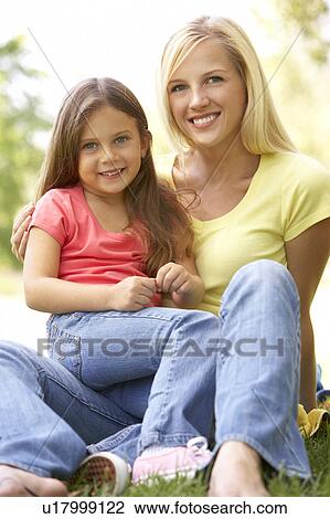 Portrait Of Mother And Daughter In Park View Large Photo Image Stock Image - Portrait Of Mother And Daughter In Park. Fotosearch