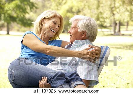 Portrait Of Senior Couple Enjoying Day In Park View Large Photo Image Stock Photography - Portrait Of Senior Couple Enjoying Day In Park. Fotosearch